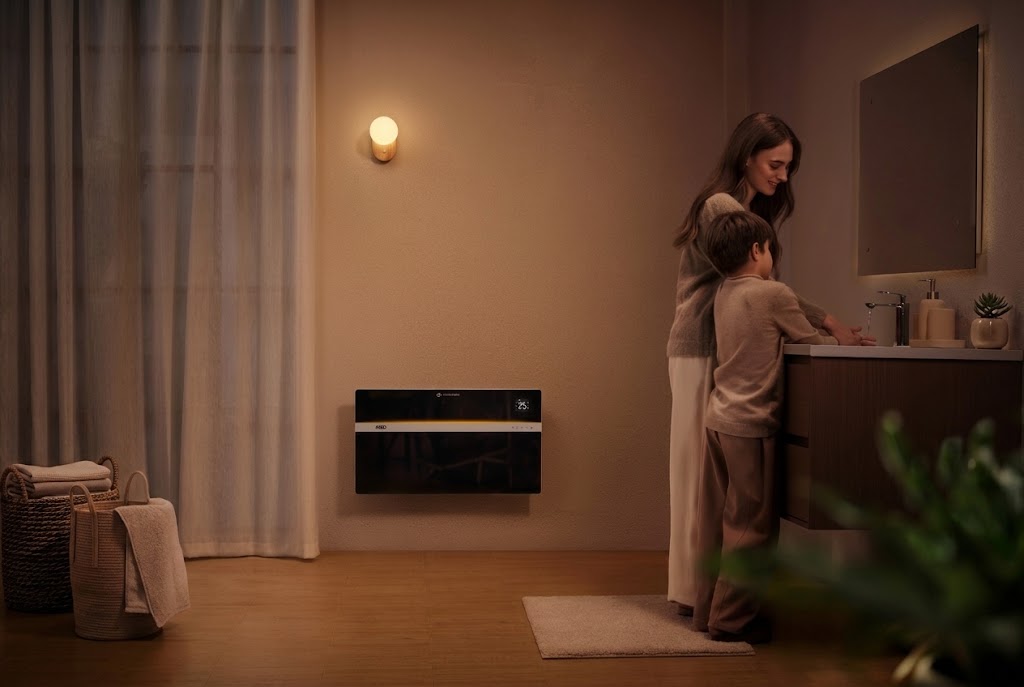 Convecteur mural DREO 711S dans une chambre